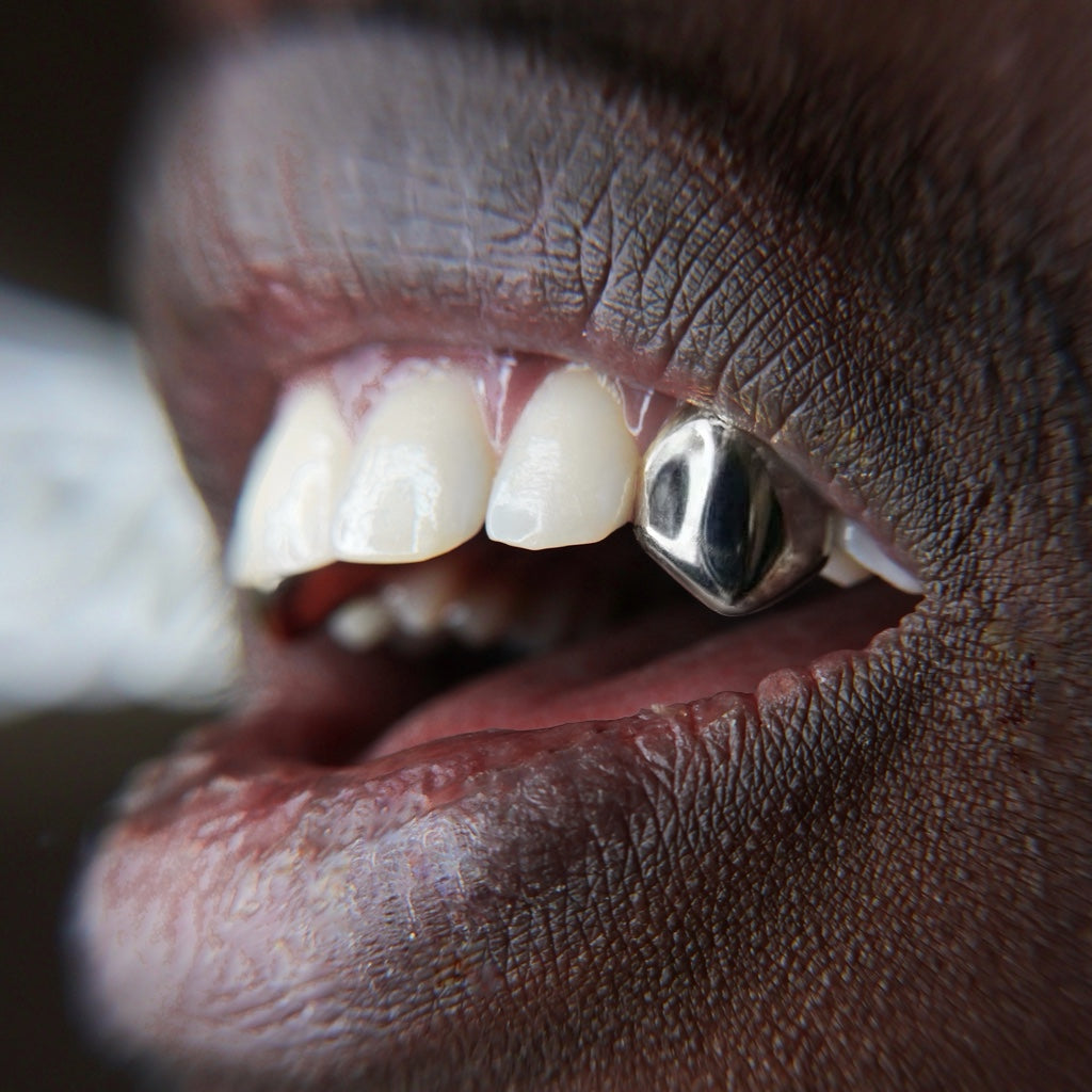 Single tooth (solid or outline)